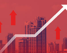 An arrow graphic depicts rising costs against against a city backdrop.