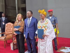 Signing for WINLPG Cameroon: Alison Abbott, WINLPG cofounder and WLGA communications director alongside Cameroon Minister of Energy and Water Resources, Gaston Eloundou Essomba, and Cameroon Minister of Women Empowerment and the Family, professor Marie-Thérèse Abena Ondoa