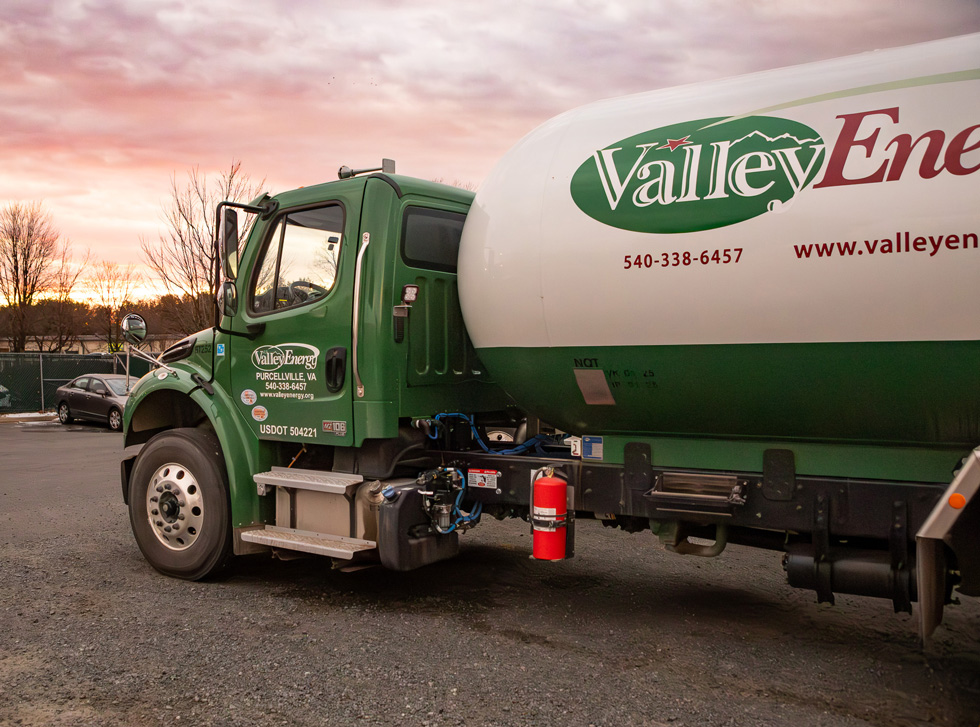 A propane delivery vehicle from Valley Energy is featured.