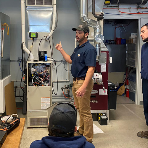 A PPATEC instructor teaches about gas heaters.