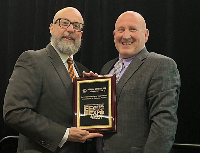 Scott Fenwick receives a plaque.