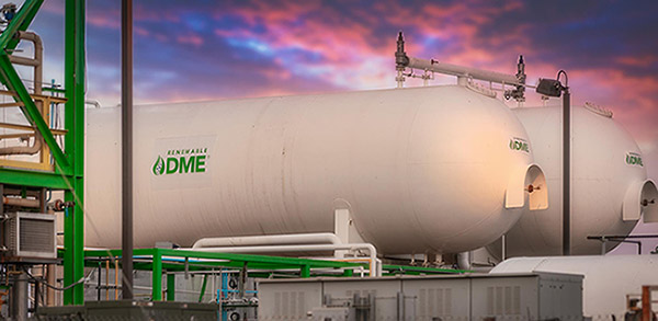 A tank of renewable DME (dimethyl ether) is featured against a sunset backdrop.