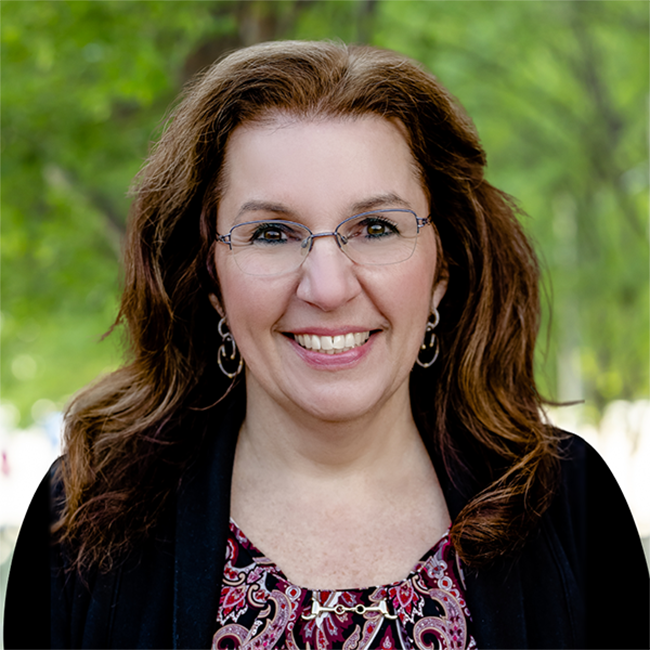 Pam Giordano poses for a headshot.