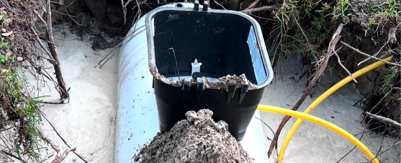 An underground propane tank is pictured as it is being maintenanced.