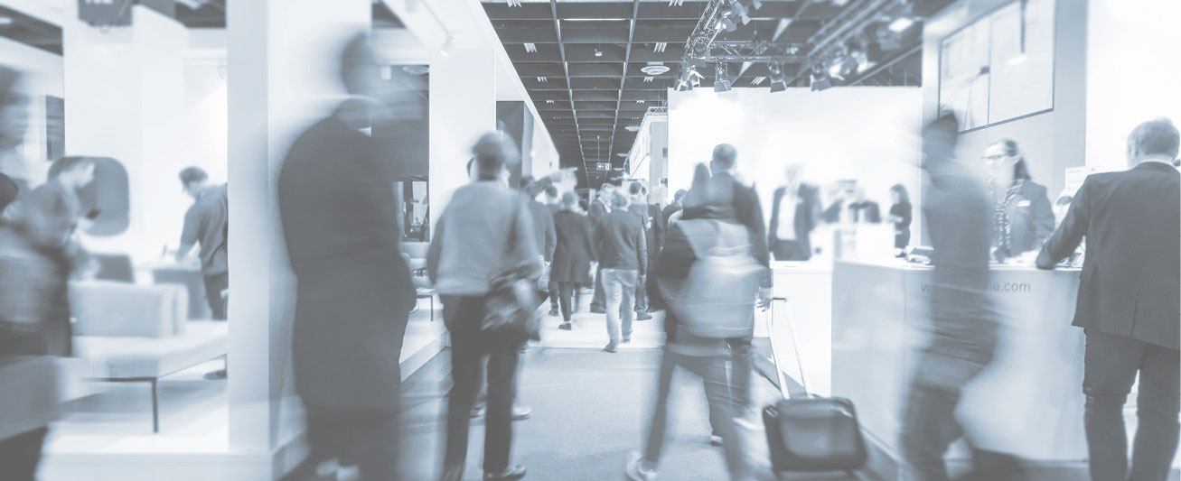 trade show attendees on the exhibit floor