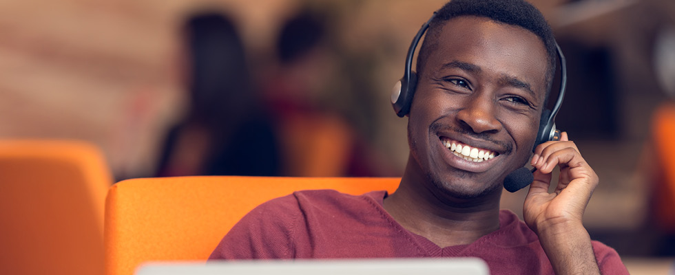 An image of a customer service representative smiling.