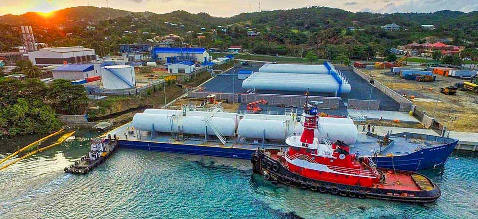 Propane tank storage on a pier with a ship coming to port