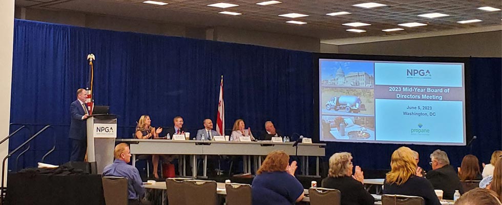 The 2022-2023 NPGA officers sit in a panel onstage at the 2023 summer board of directors meeting