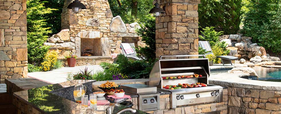 A picture features a luxurious outdoor kitchen.