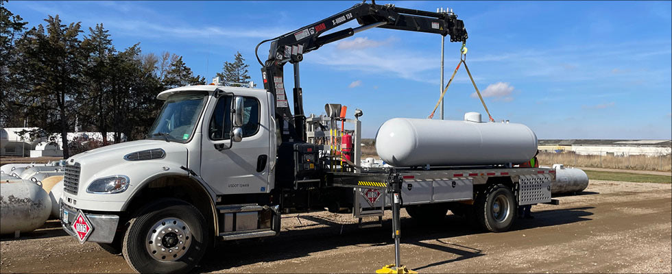 A truck loading a propane tank
