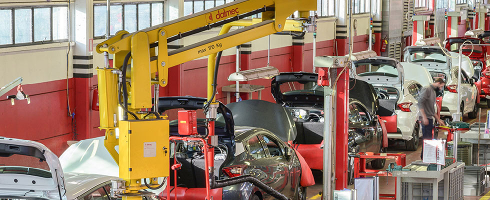 An assembly line of cars fine-tuned to run on propane autogas.