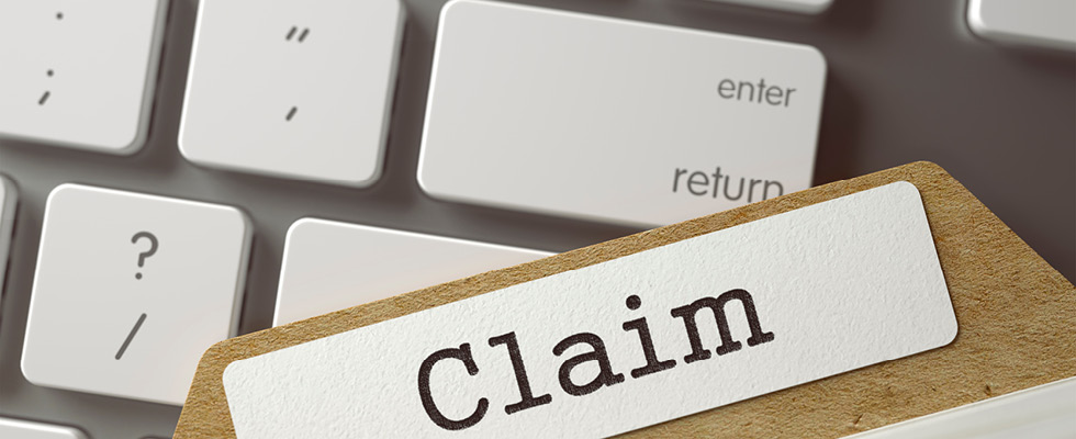 A graphic displays a file with the word "claim" on it.