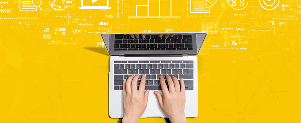 A clip art depicts two hands resting on a laptop against a yellow backdrop.