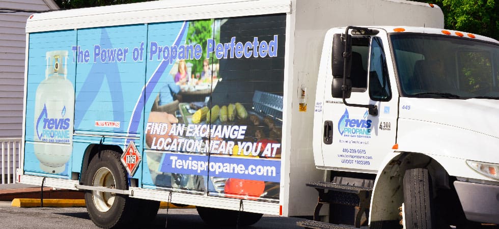 A Tevis Propane truck advertising exchange racks