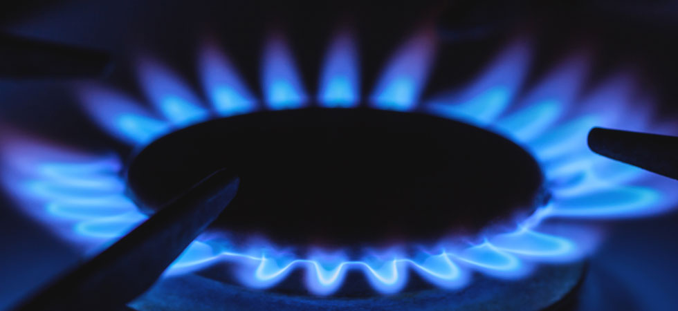 Blue flames on from a gas stovetop