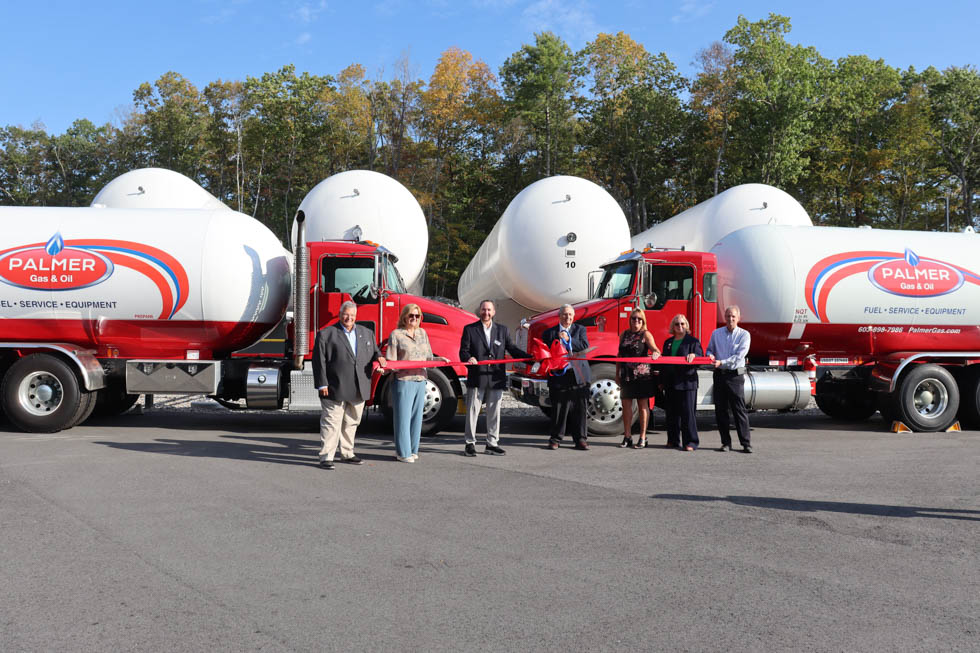 The Palmer Gas & Oil team has a ribbon cutting ceremony at its new storage facility.