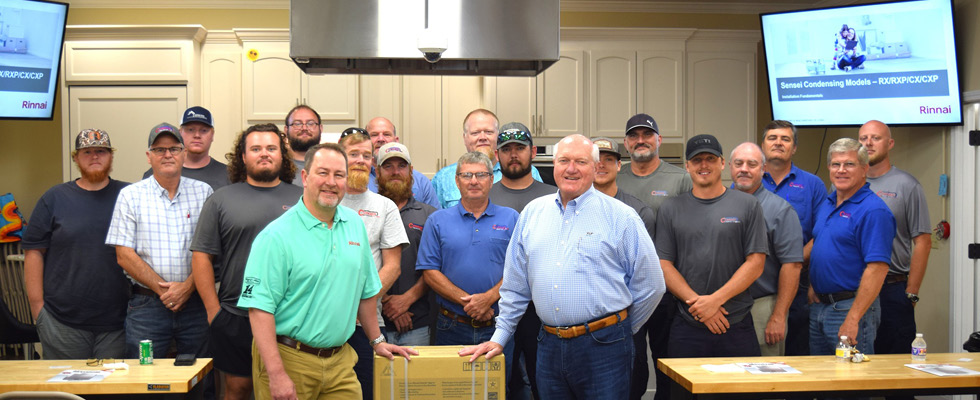 The Conger Gas team poses on the set of a video shoot.
