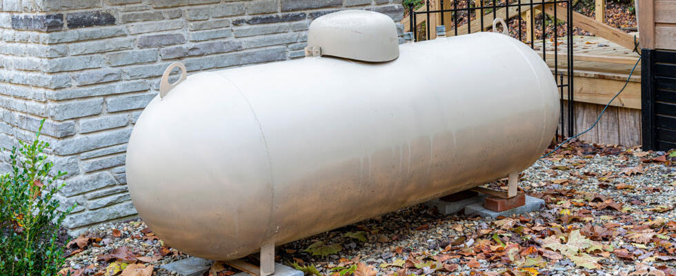 An image of a propane tank is featured, showcasing the importance of propane tank placement.