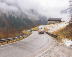 A propane bobtail drives on a curvy mountain road to illustrate the 2026 state of the propane industry
