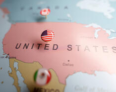 A map of the U.S. brings attention to modern tariff policies.