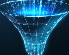 A holographic funnel is depicted in blue light, as blue lights of data stream into it from above.