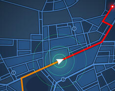An image displays a GPS on a blue city road map.
