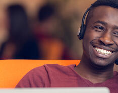 An image of a customer service representative smiling.