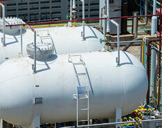 Two large LP gas tanks are pictured, showcasing what might be checked at a bulk or industrial plant inspection.