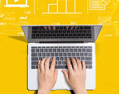 A clip art depicts two hands resting on a laptop against a yellow backdrop.