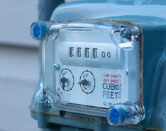 A close-up of a gas meter is pictured.