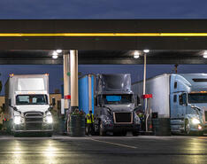 Trucks refill at a natural gas station.