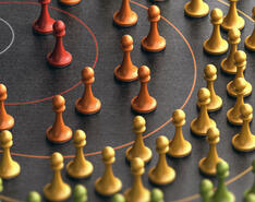 Increasingly large concentric circles with chess pieces show the strategy involved in marketing propane.