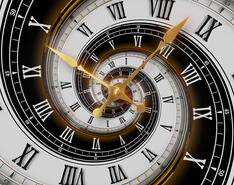 A clock is featured, showcasing the topic of time travel in this month's Verbatim