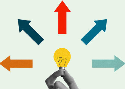 Arrows pointing away from a lightbulb