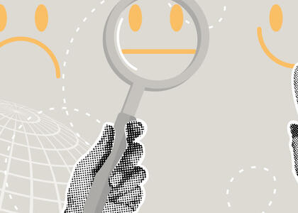 Two hands point and hold up a magnifying glass on a frowny face, a neutral face and a smiling face.