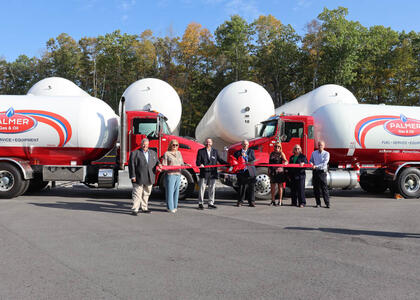 The Palmer Gas & Oil team has a ribbon cutting ceremony at its new storage facility.