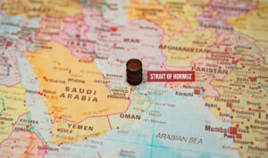 A map depicts the geographic area surrounding the Strait of Hormuz