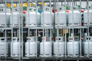 Gas cylinders for commercial propane use loaded on a transport truck
