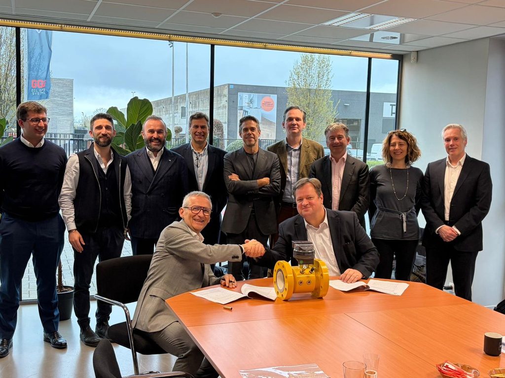 Cavagna Group and GMG members celebrate the recent acquisition deal.
